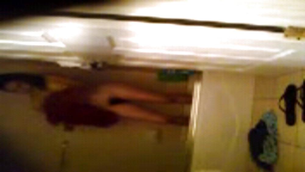 13P Melina taking a shower hidden cam
