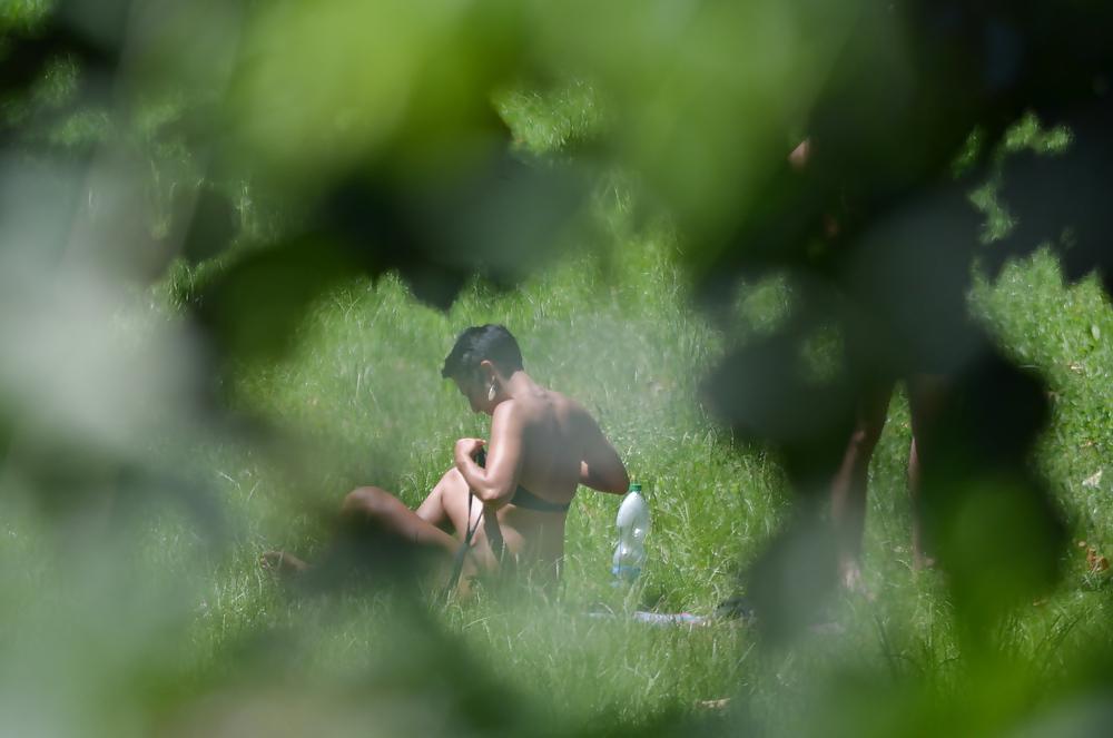 21P Milf sunbathe in the park