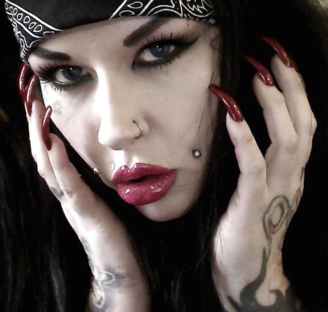 25P Heavy makeup and long nails
