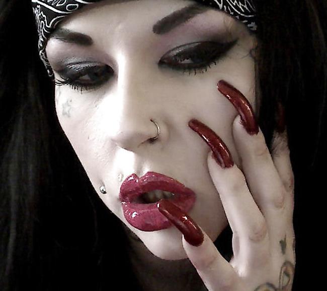 25P Heavy makeup and long nails