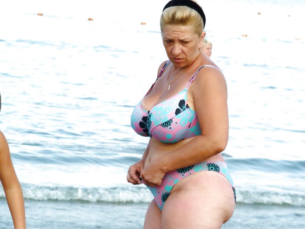 18P Russian woman with big boobs on the beach!