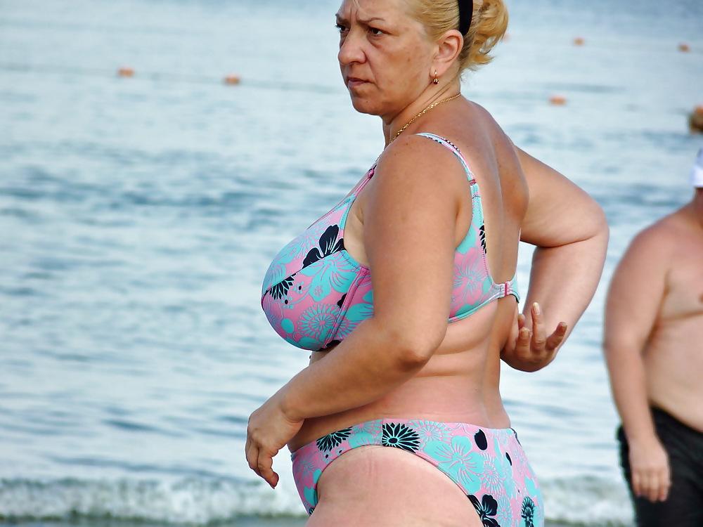 18P Russian woman with big boobs on the beach!