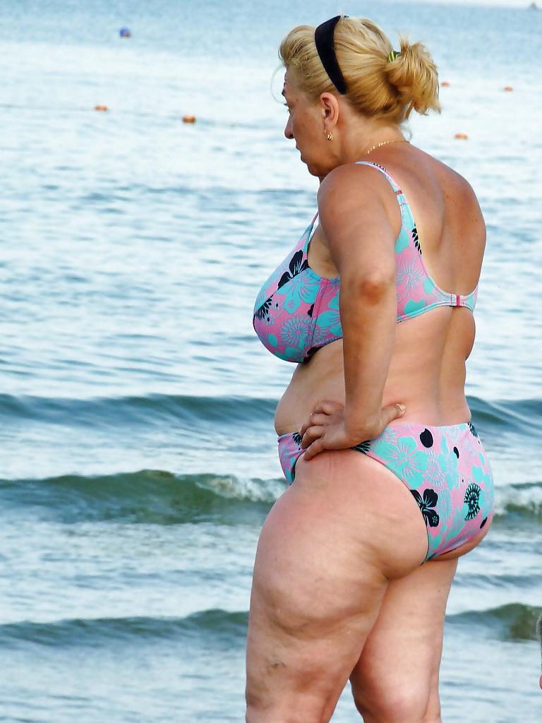 18P Russian woman with big boobs on the beach!