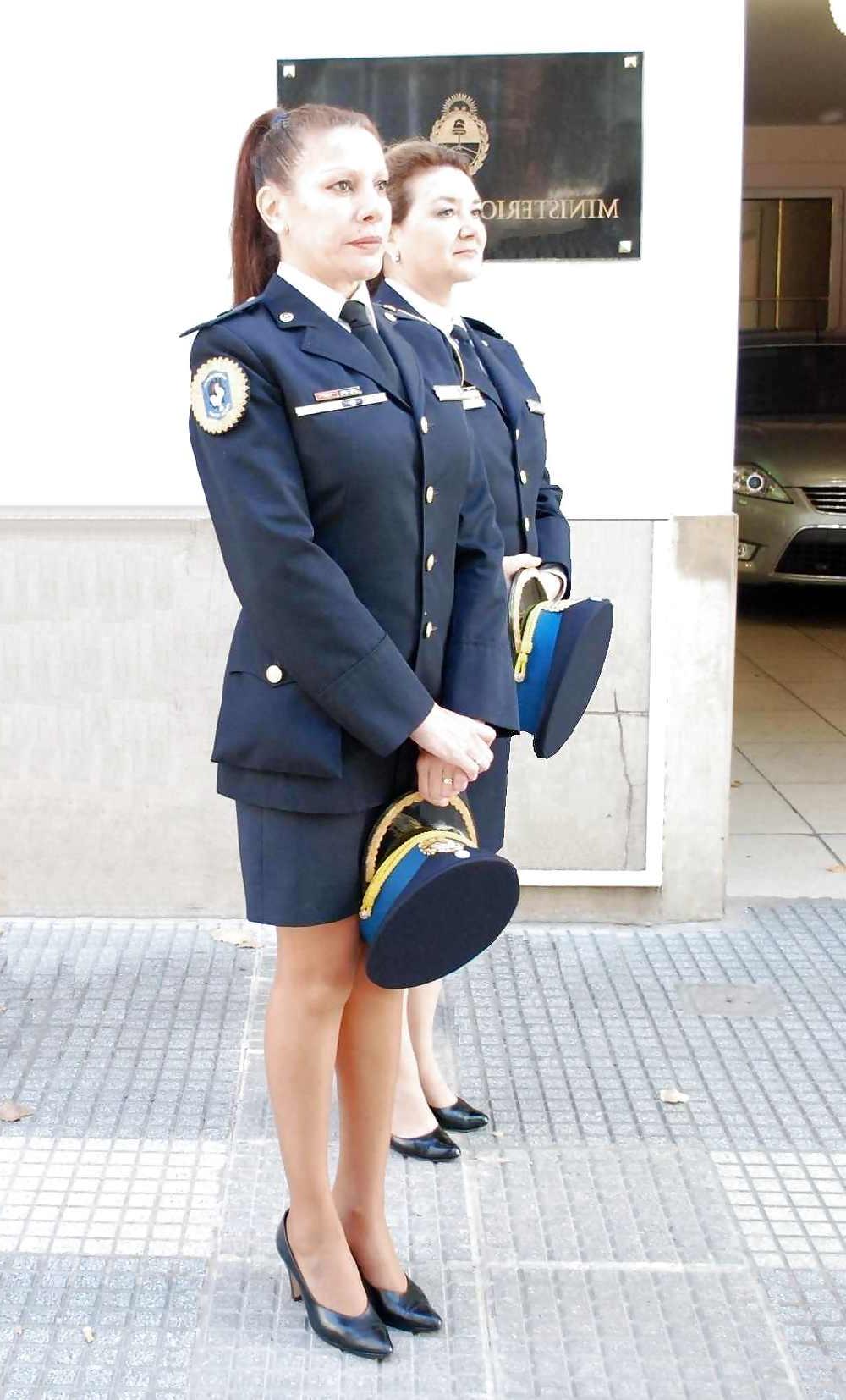 7P Women in uniforms wearing nylons..