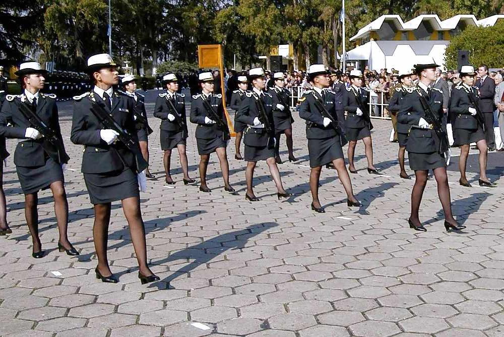 7P Women in uniforms wearing nylons..