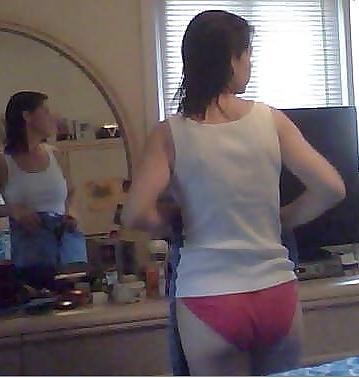 12P My wife stuffing her pink panty ass into a pair of jeans