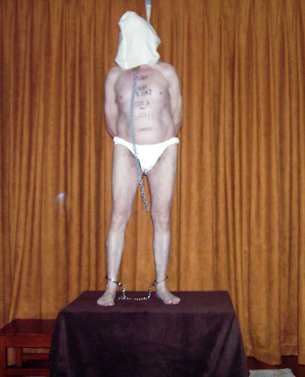 25P Naked male slave for rent. 