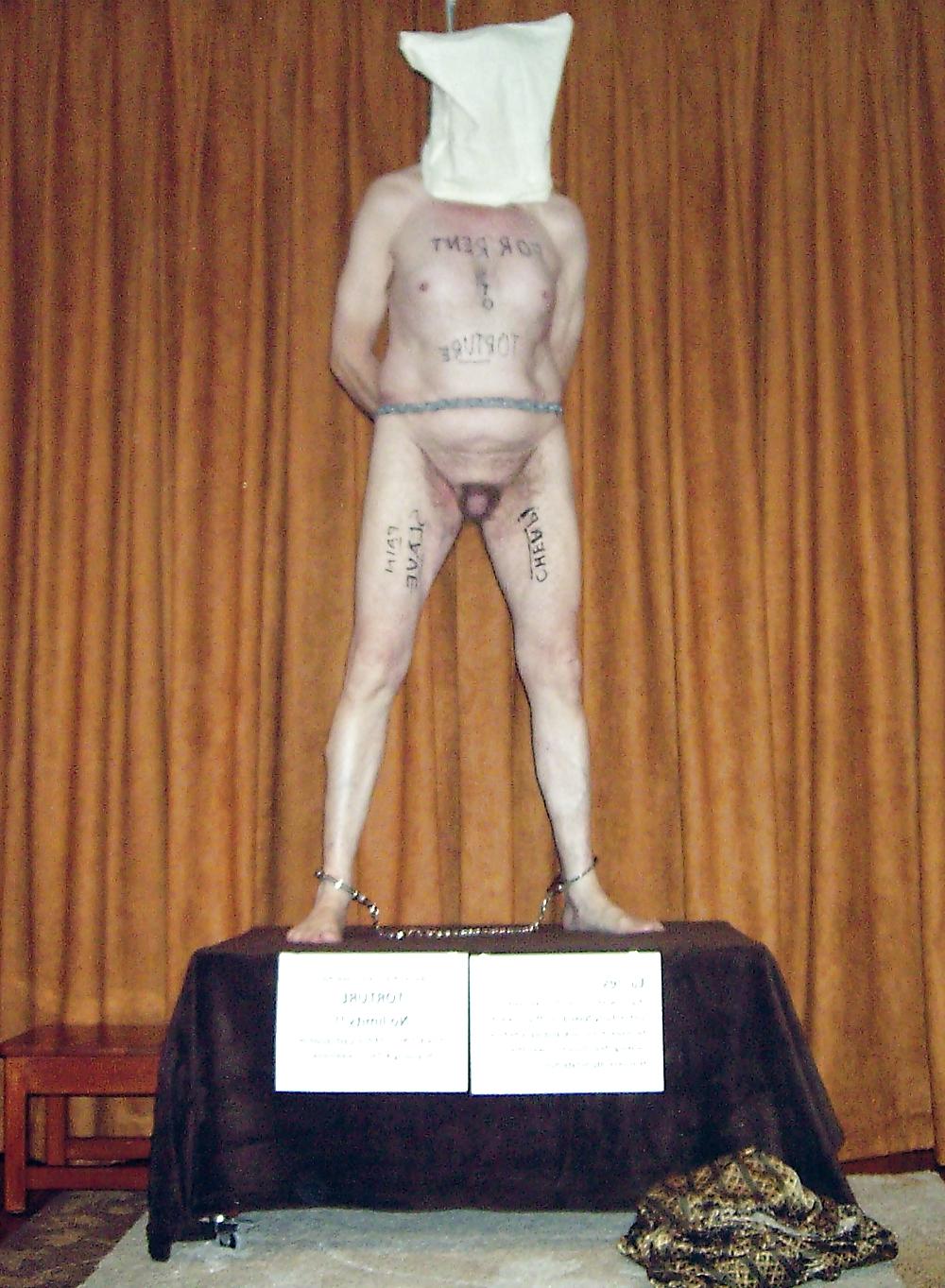 25P Naked male slave for rent. 