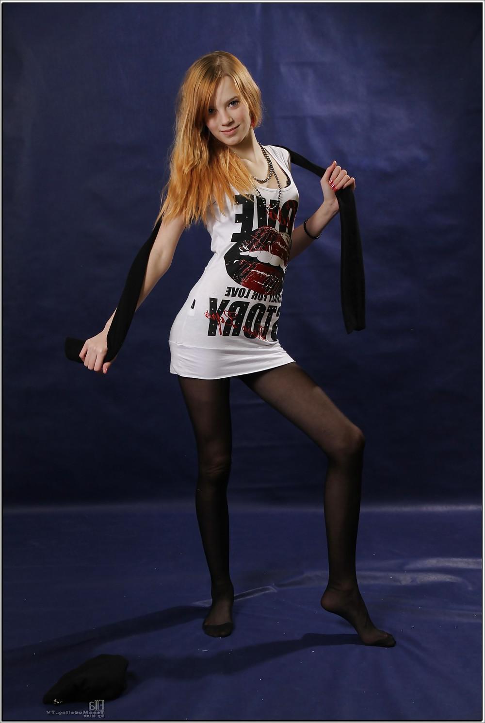 17P Lovely teen in black pantyhose