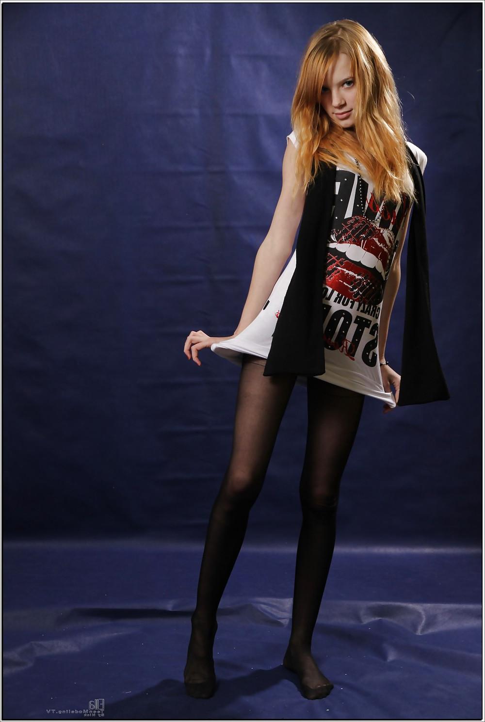 17P Lovely teen in black pantyhose