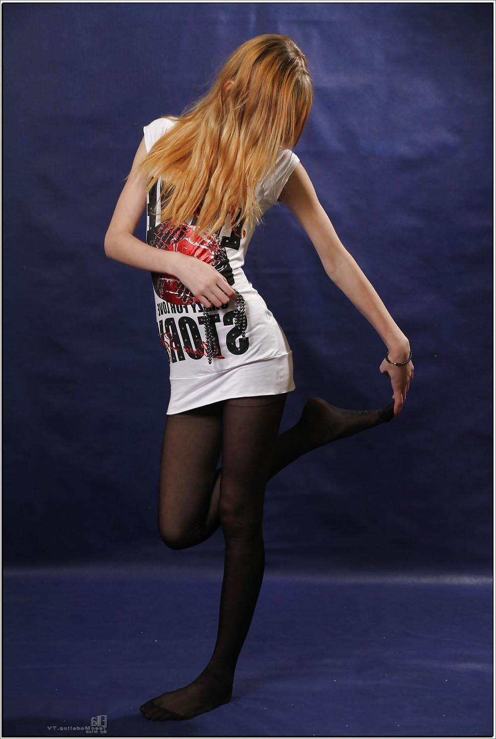 17P Lovely teen in black pantyhose