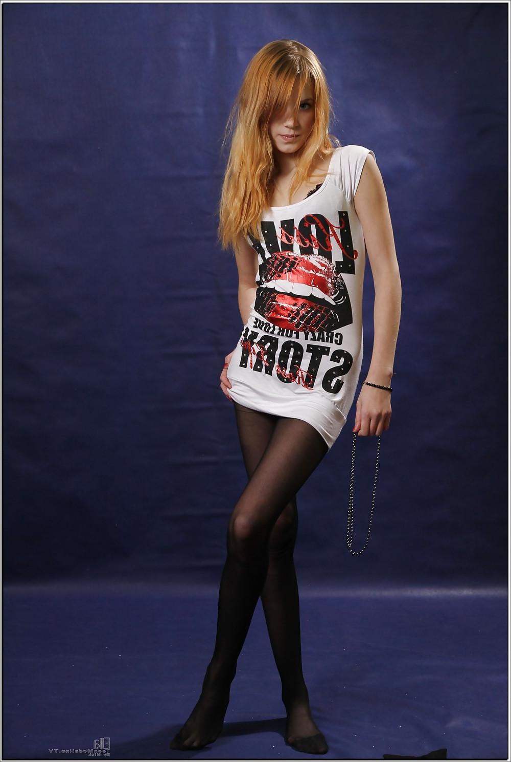 17P Lovely teen in black pantyhose