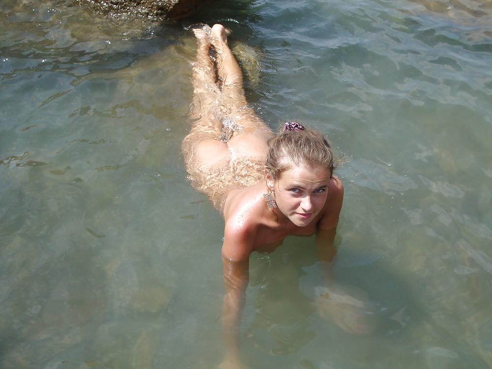 25P Nudist recreation of a young couple in the Crimea