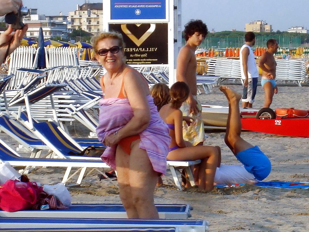 25P Busty granny on the beach! Mixed!