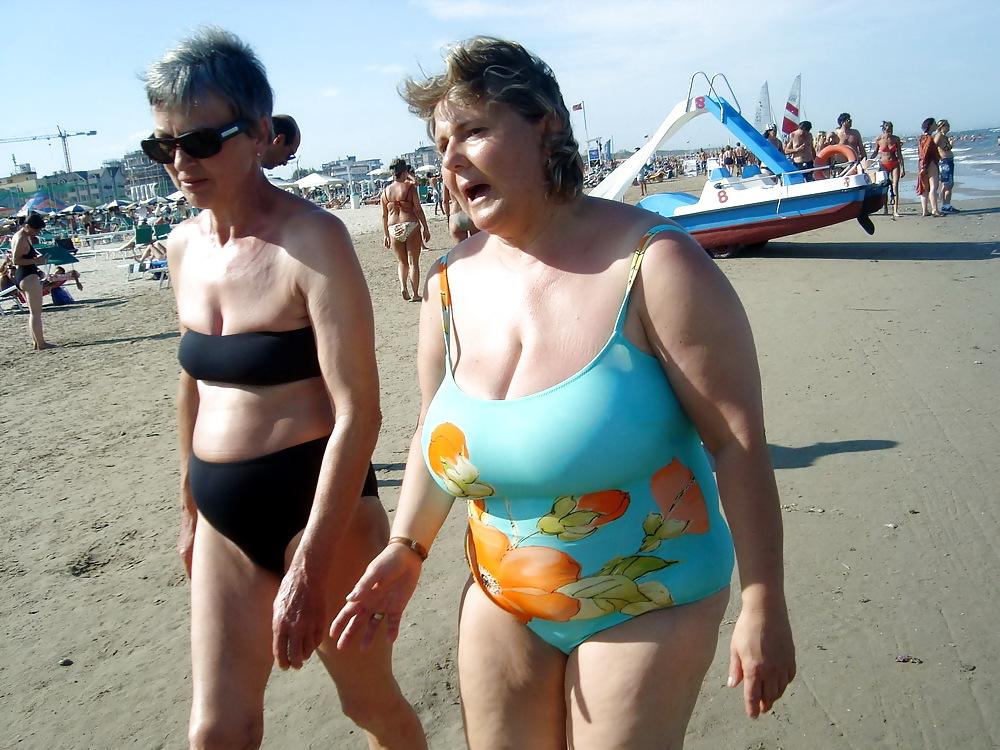 25P Busty granny on the beach! Mixed!