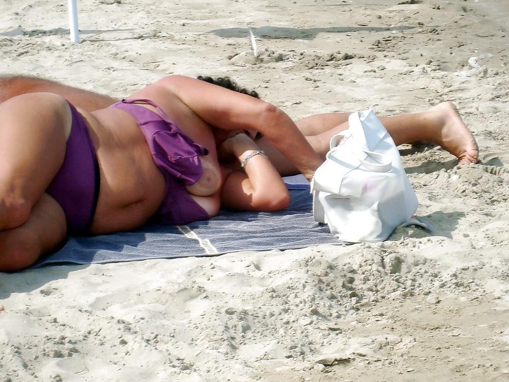 25P Busty granny on the beach! Mixed!