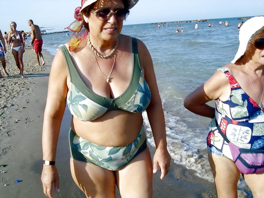 25P Busty granny on the beach! Mixed!