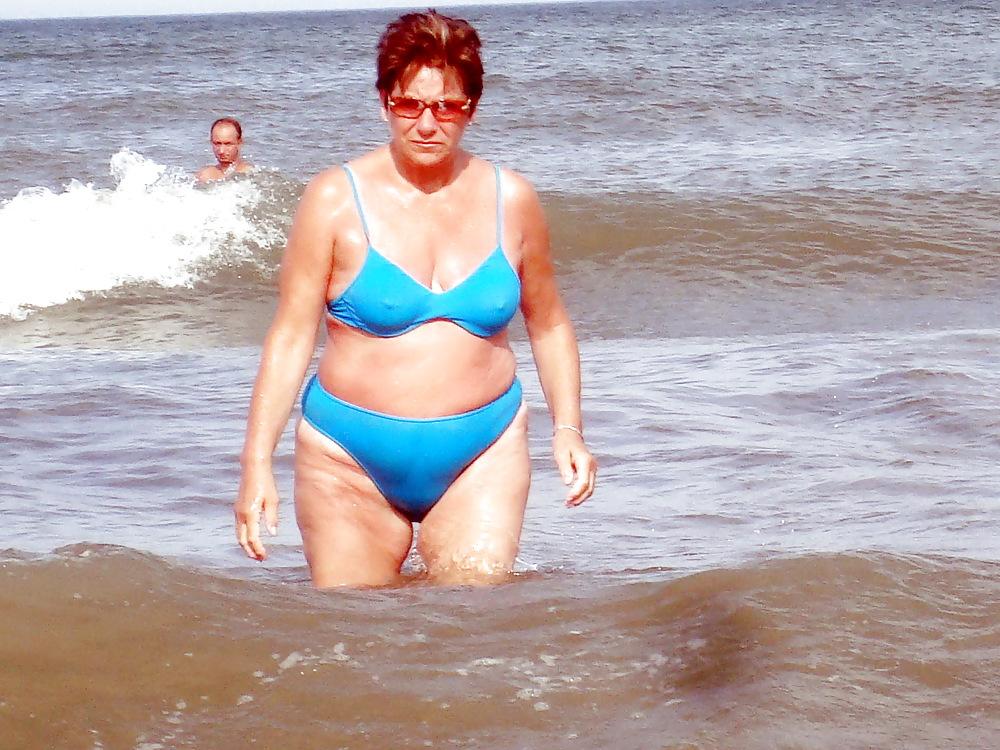 25P Busty granny on the beach! Mixed!