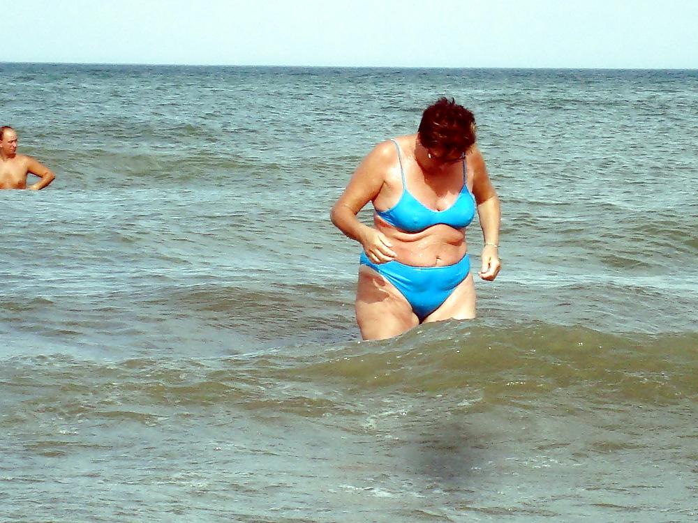 25P Busty granny on the beach! Mixed!