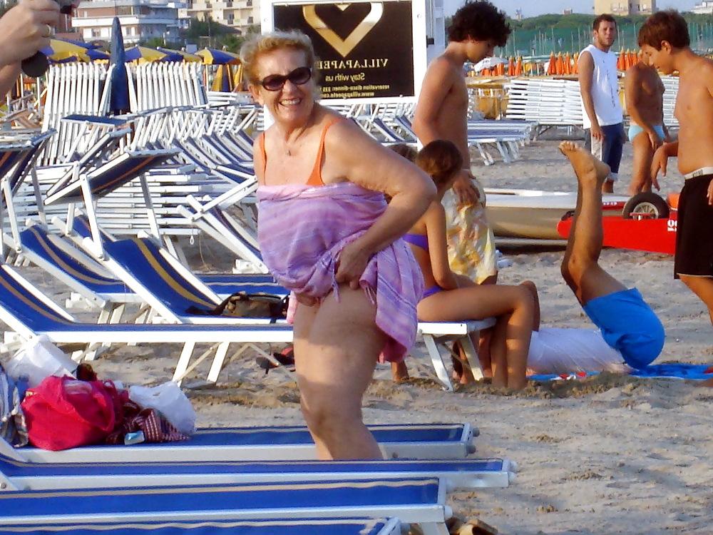 25P Busty granny on the beach! Mixed!
