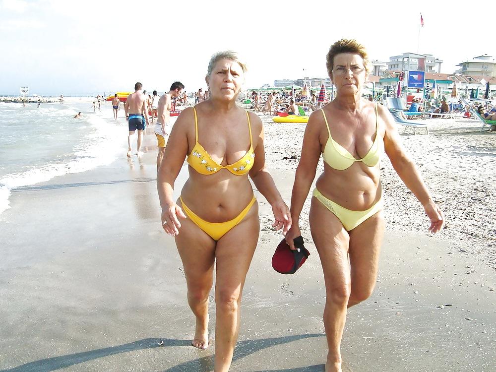25P Busty granny on the beach! Mixed!