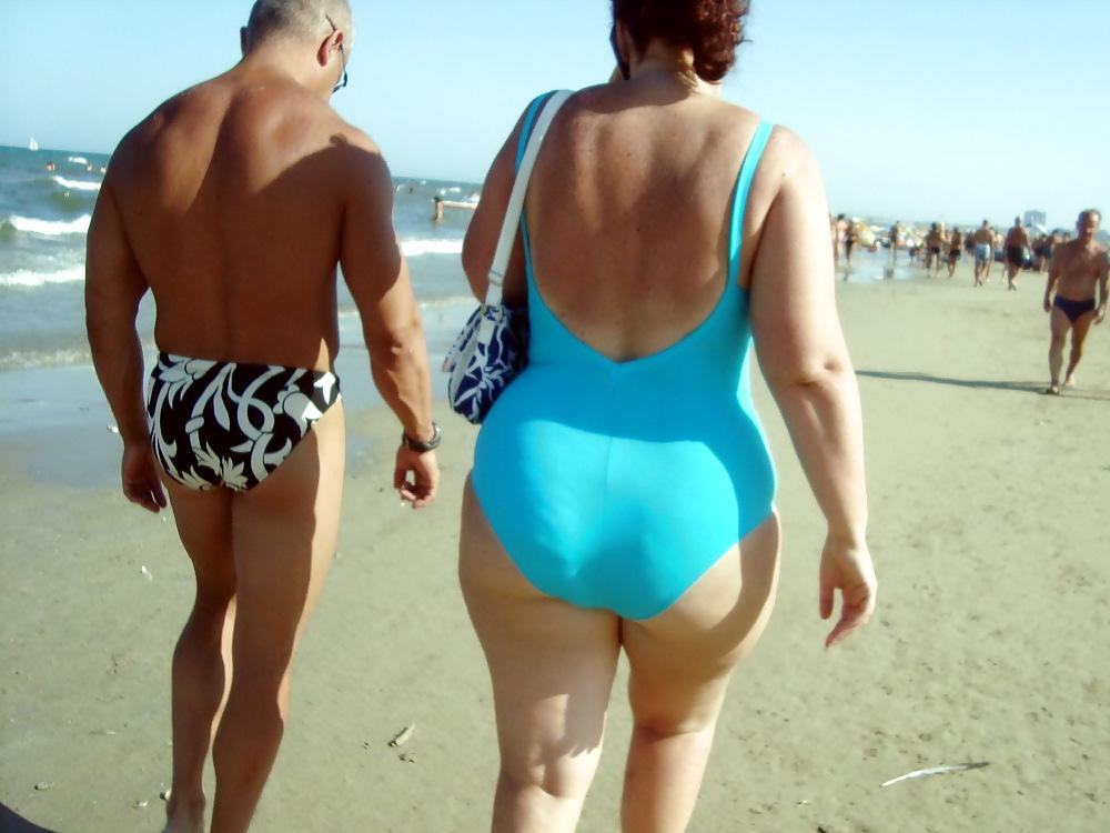 25P Busty granny on the beach! Mixed!