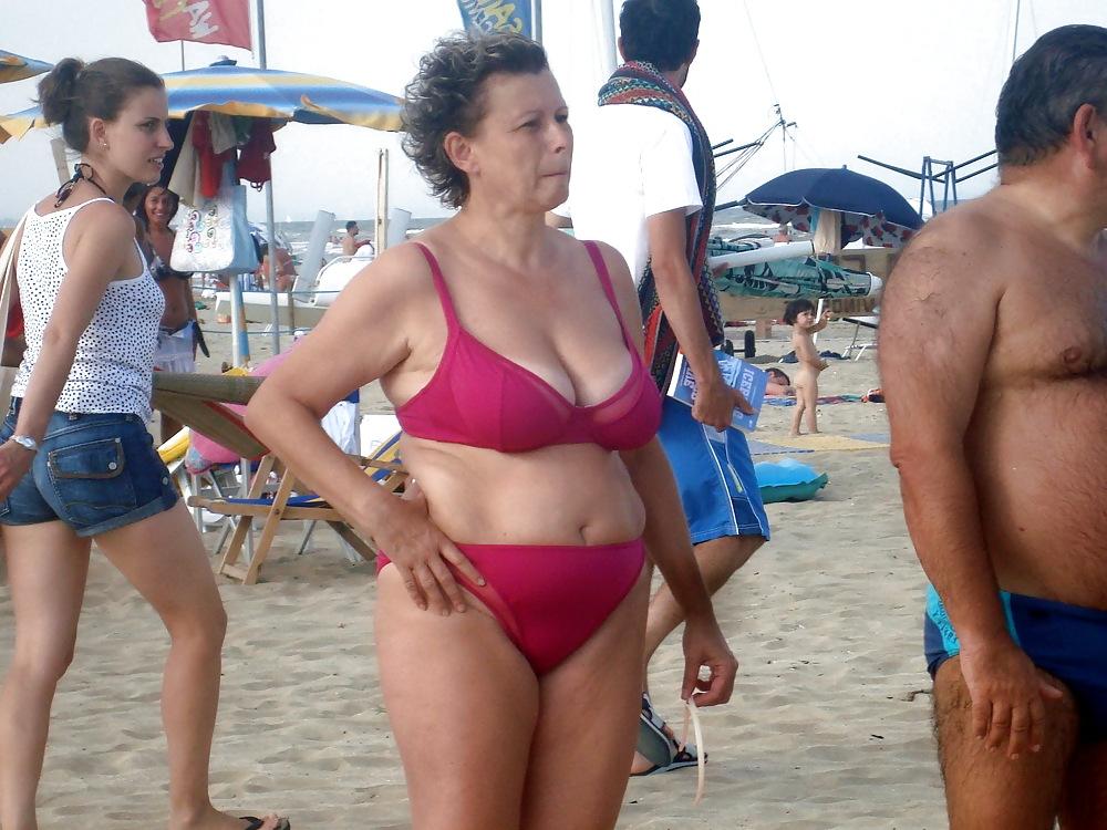 25P Busty granny on the beach! Mixed!