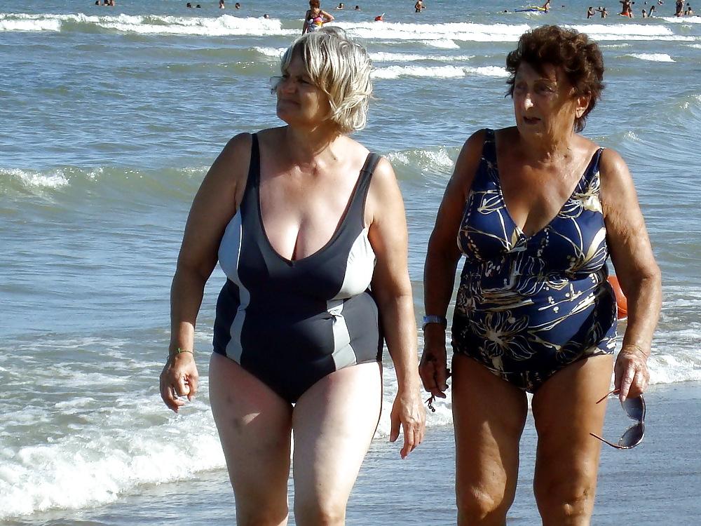 25P Busty granny on the beach! Mixed!