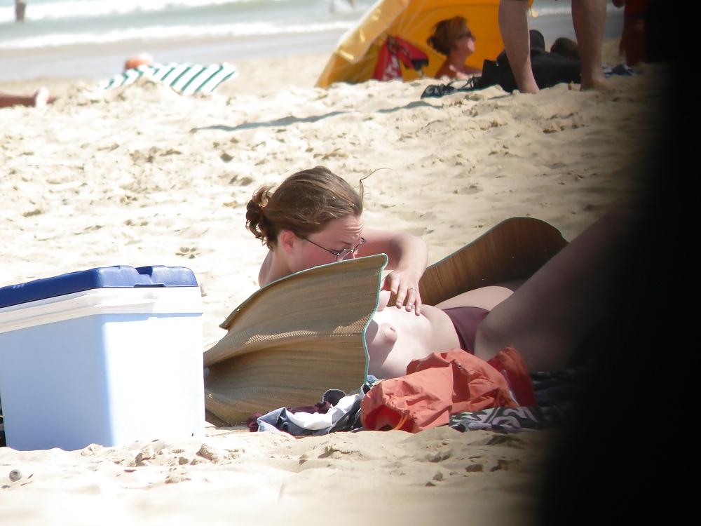 25P Topless brunette hippy girl with puffies