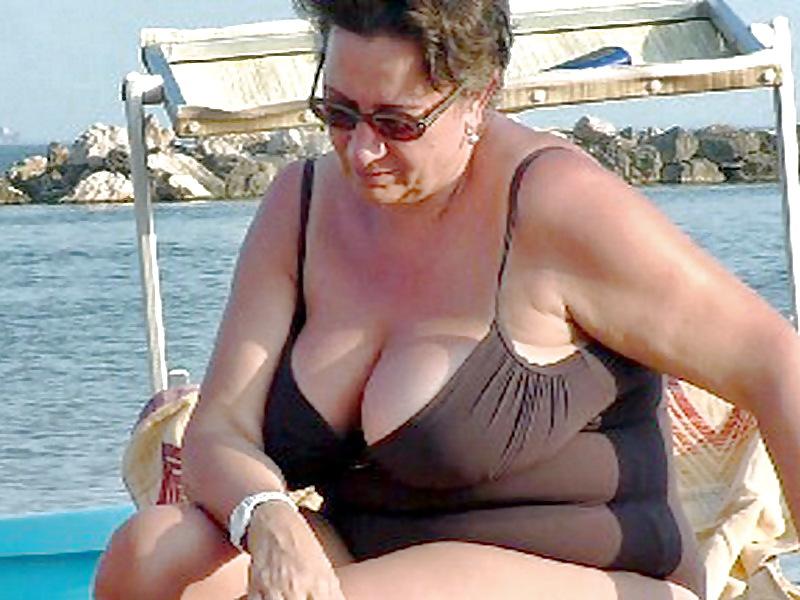 25P Busty granny on the beach! Mixed!