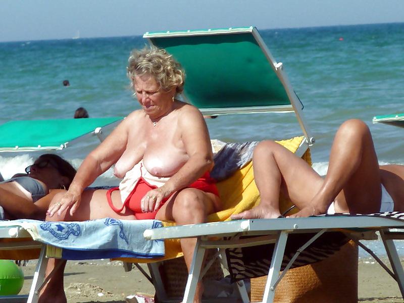 25P Busty granny on the beach! Mixed!