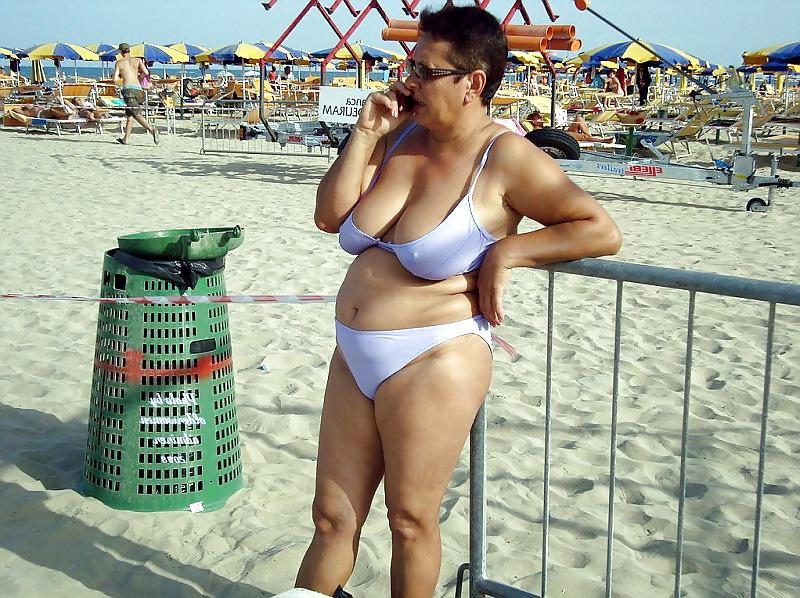 25P Busty granny on the beach! Mixed!