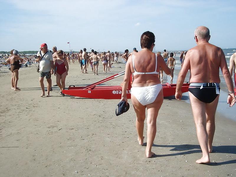25P Busty granny on the beach! Mixed!