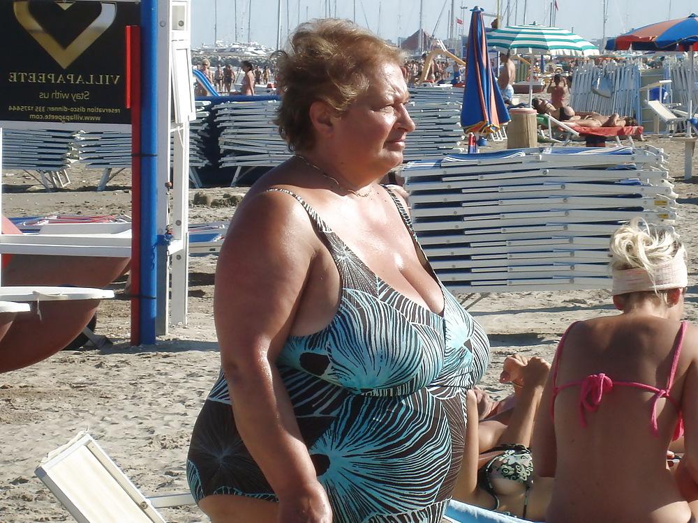 25P Busty granny on the beach! Mixed!