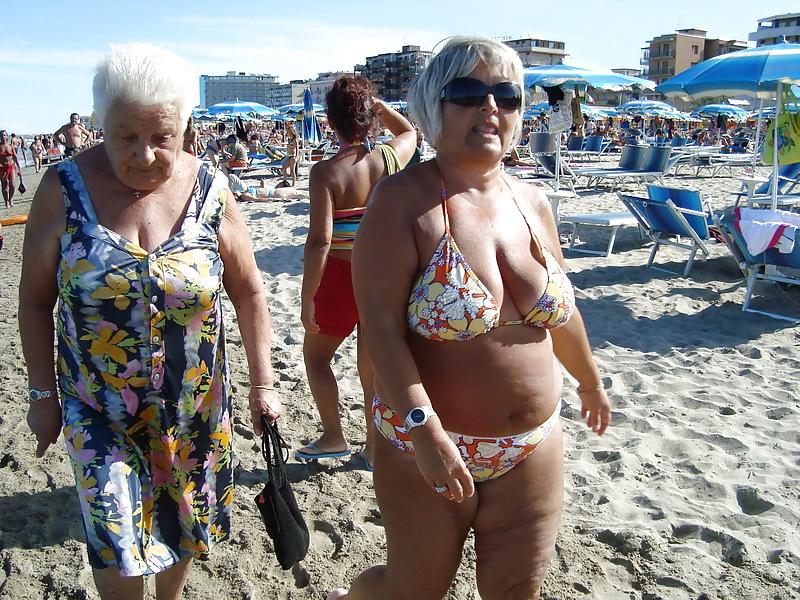 25P Busty granny on the beach! Mixed!