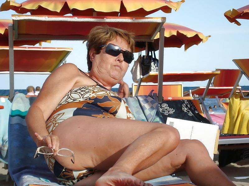 25P Busty granny on the beach! Mixed!
