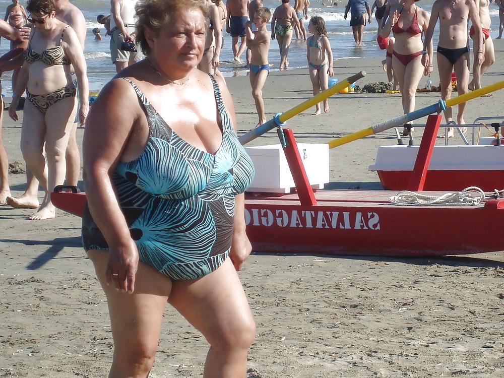 25P Busty granny on the beach! Mixed!