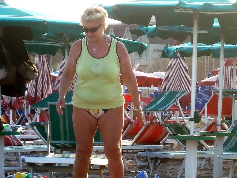 25P Busty granny on the beach! Mixed!