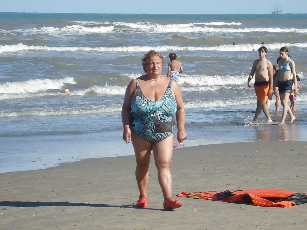 25P Busty granny on the beach! Mixed!