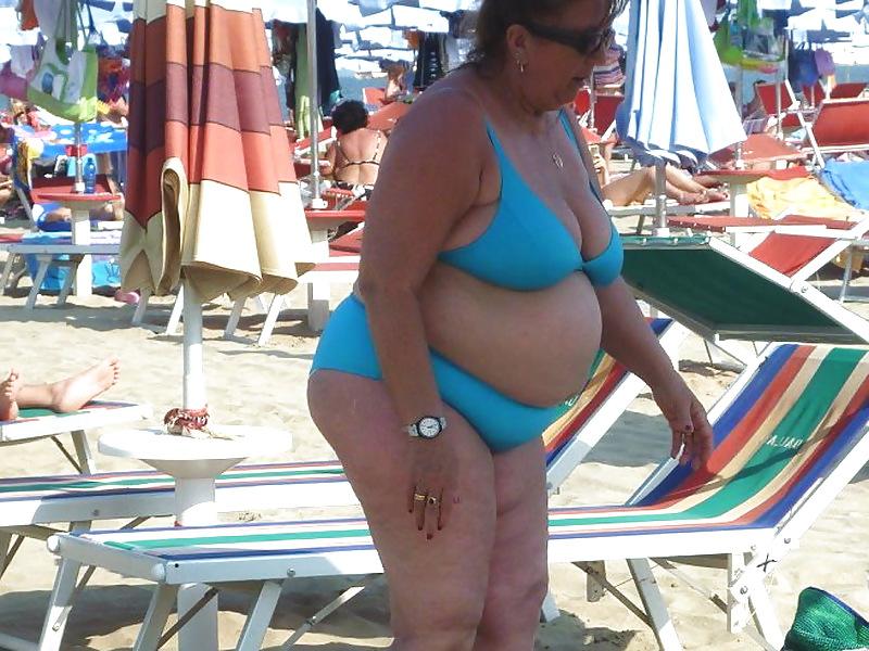 25P Busty granny on the beach! Mixed!