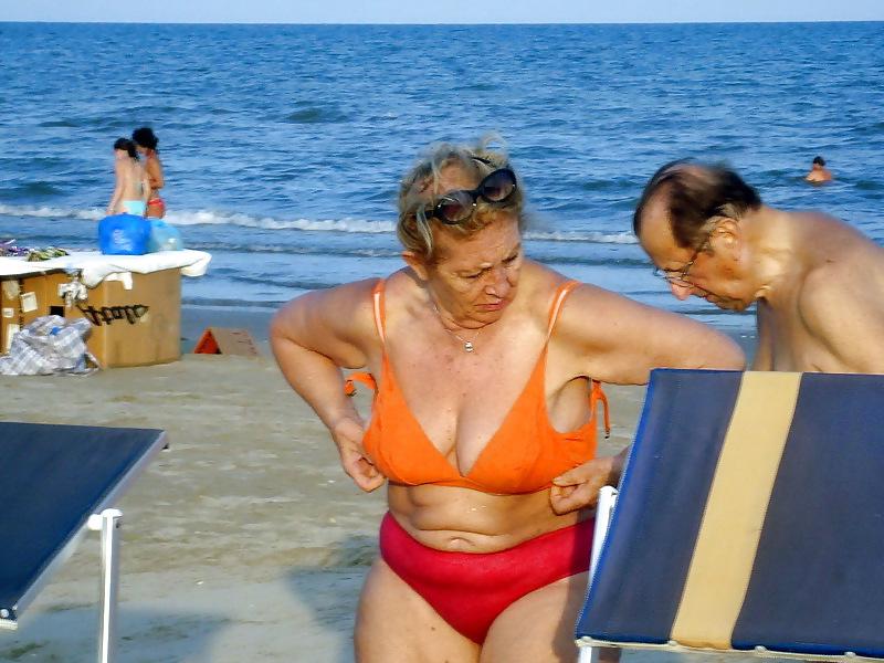 25P Busty granny on the beach! Mixed!