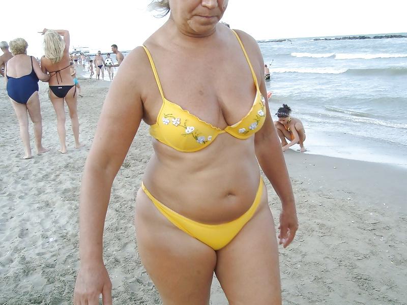 25P Busty granny on the beach! Mixed!