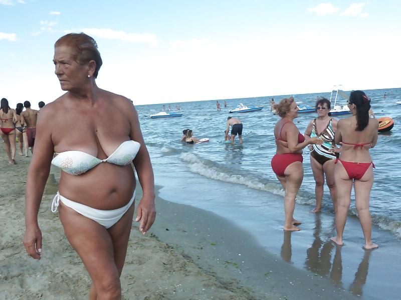 25P Busty granny on the beach! Mixed!