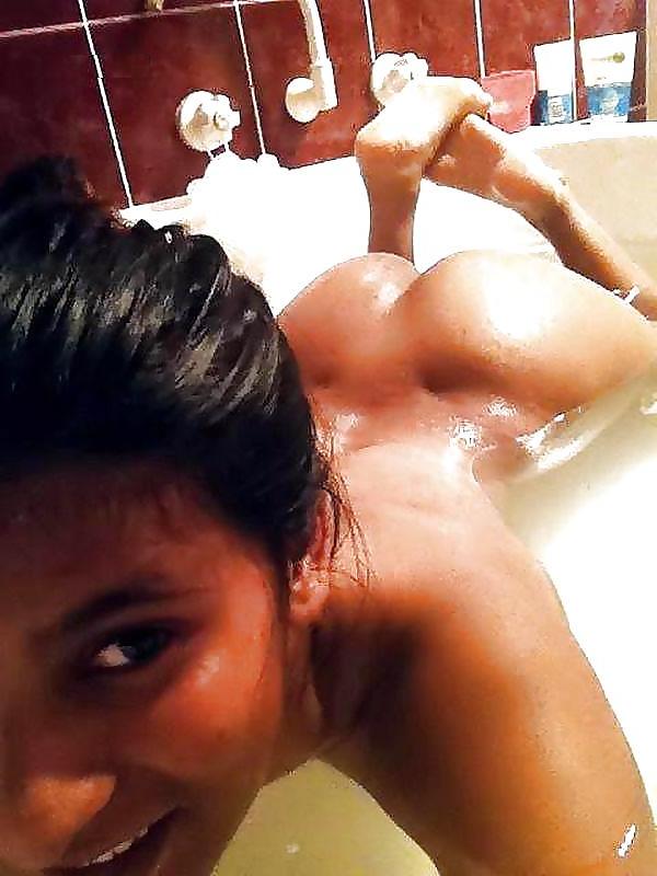 14P Ass and feet, lying down on stomach.