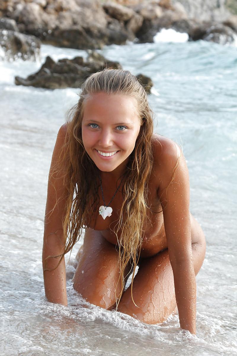 15P Blonde teen naked on the beach