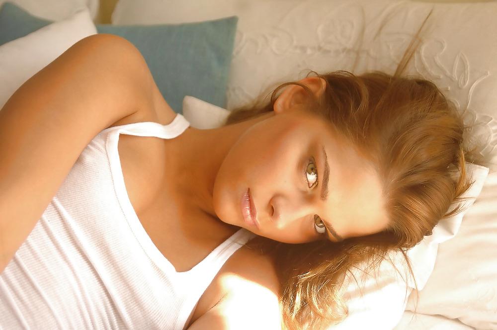 15P Dark-blonde slim Meggan posing in her bedroom
