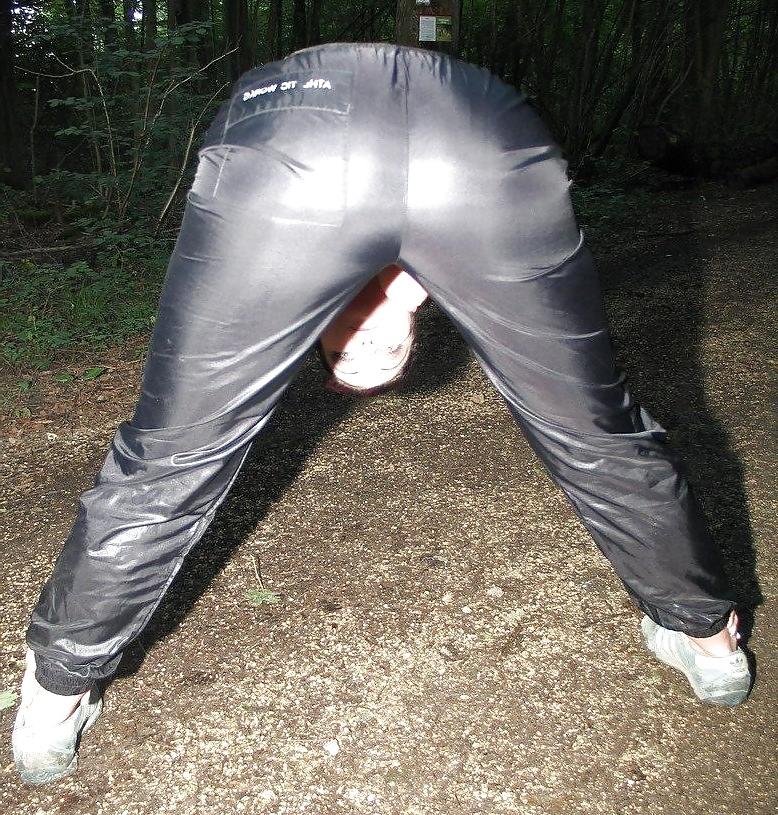 23P Girls in shiny nylon panats and tracksuits