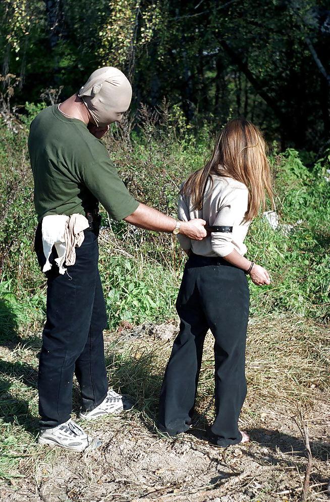 25P Cutie in white panties bound in the woods.
