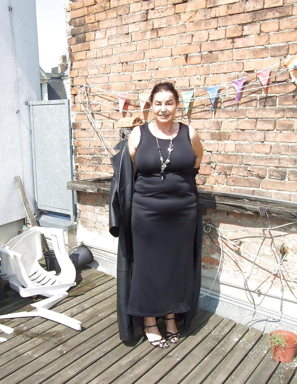 16P Mature slut naked on the terrace