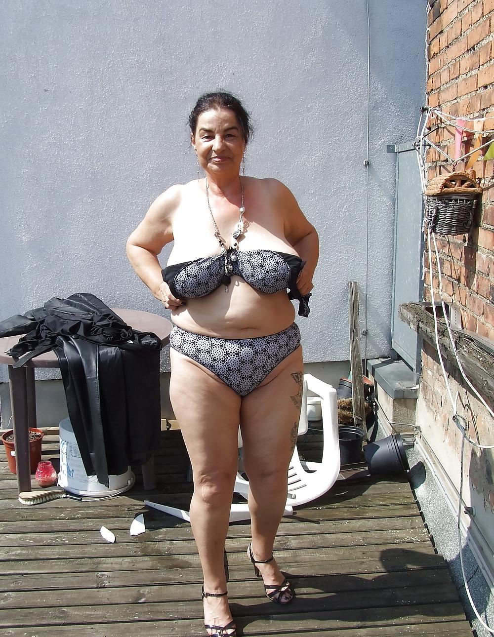 16P Mature slut naked on the terrace